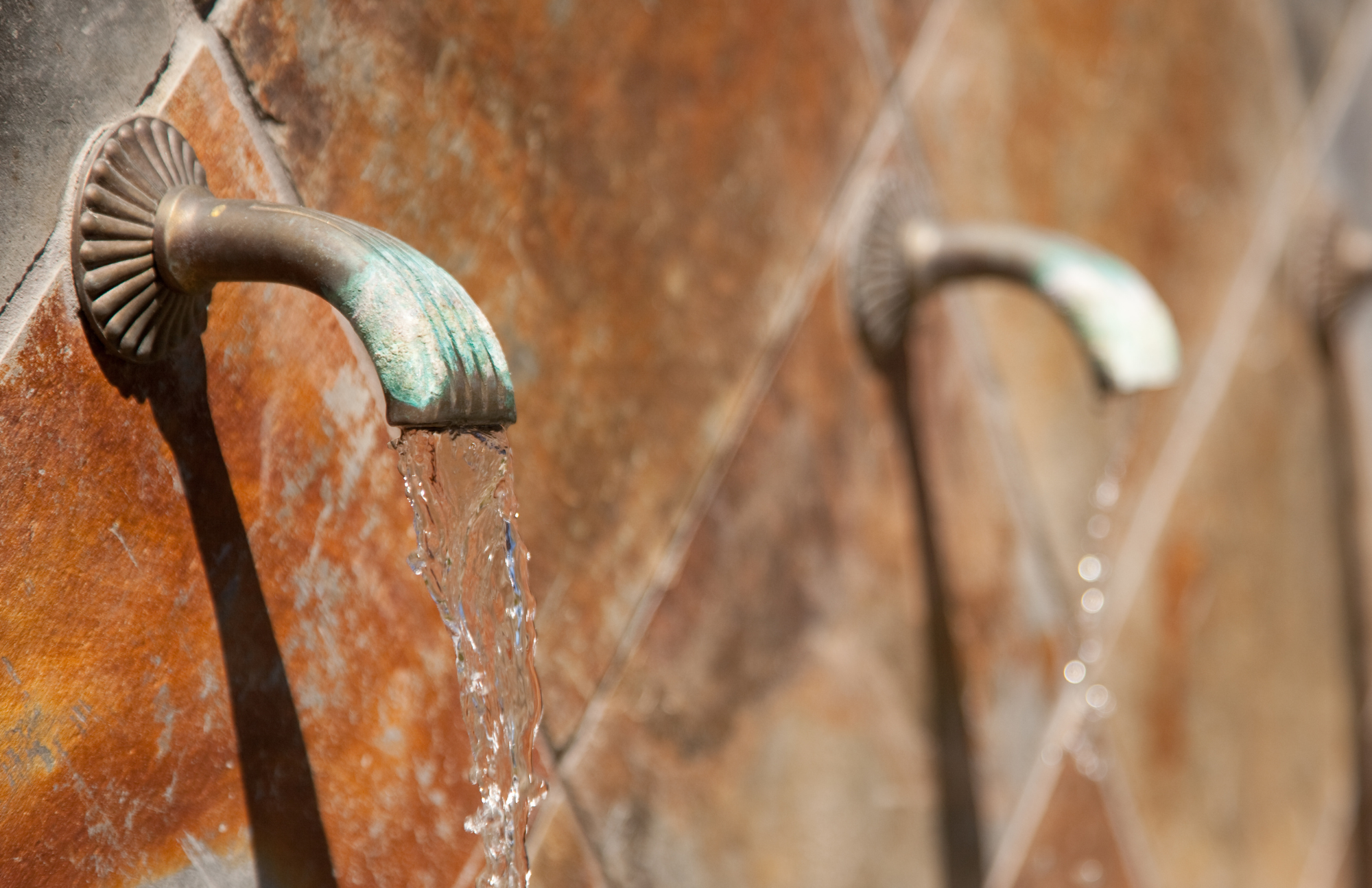 water spouts on wall